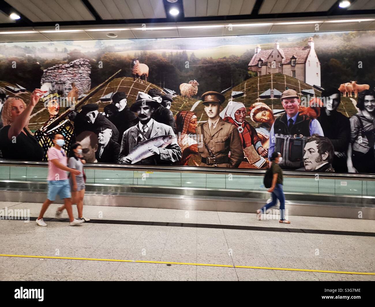 Walking under a Whiskey advertisement in Hong Kong. - Smartphone Captured Stock Image
