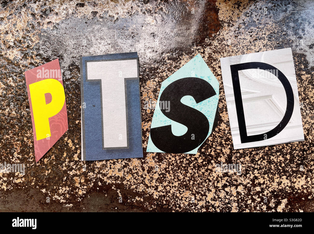 Ransom note style letters PTSD, acronym for “post traumatic stress disorder“, USA - Smartphone Captured Stock Image