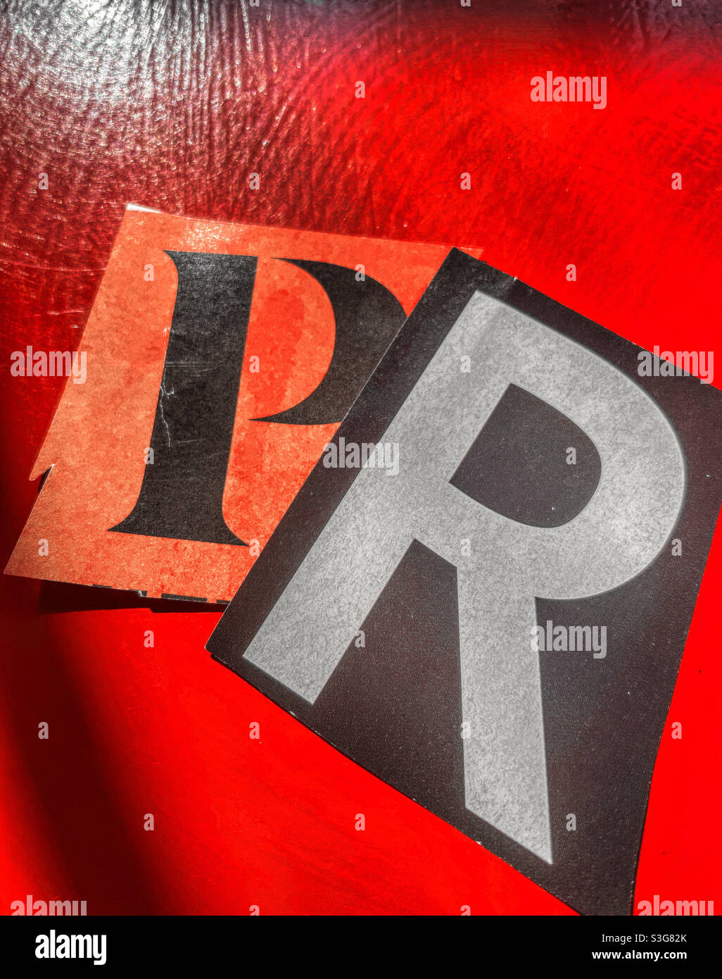 Ransom note style spelling PR, public relations, USA - Smartphone Captured Stock Image