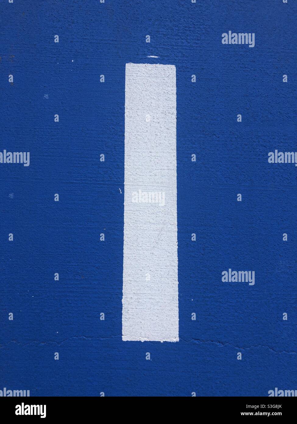 White paint on blue background - Smartphone Captured Stock Image