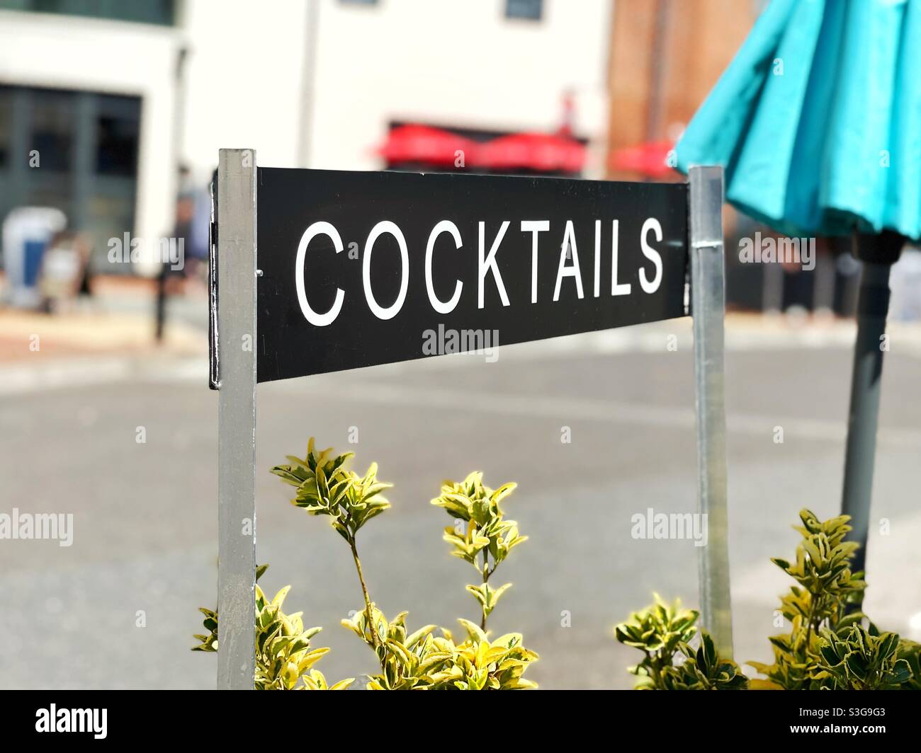 Cocktails sign at the outdoor area of a bar Stock Photo