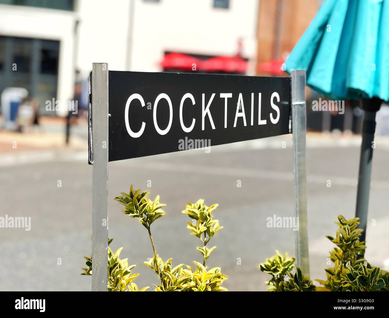 Cocktails sign at the outdoor area of a bar - Smartphone Captured Stock Image