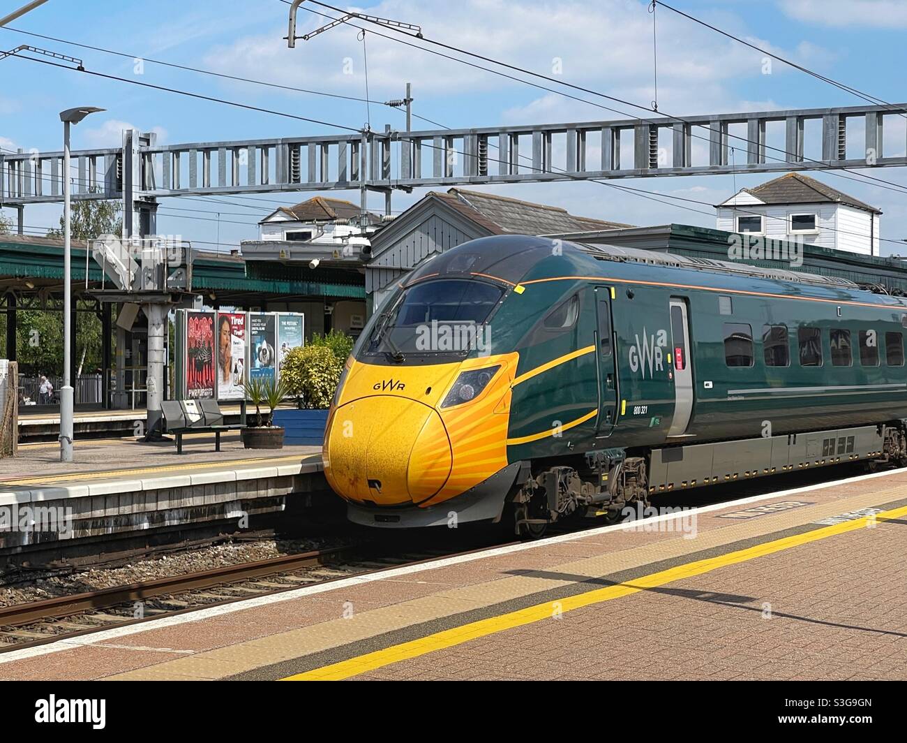Did it Parkway, England- June 2021: High speed train operated by Great Western Railway with a face mask painted onto the nose of a locomotive Stock Photo