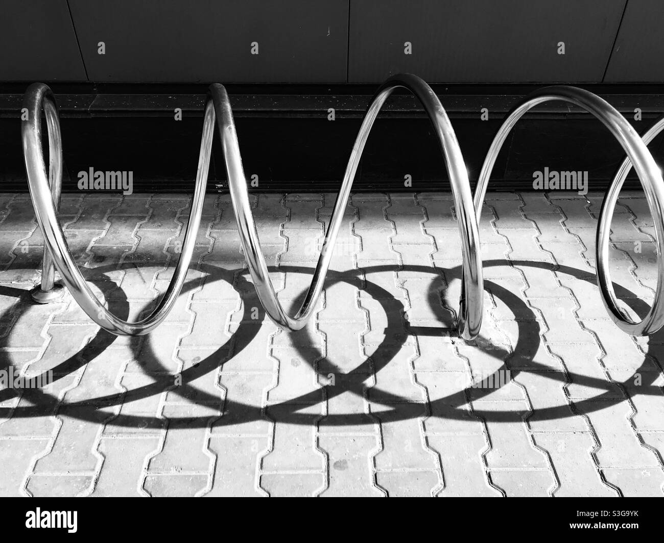 Metal spiral for bikes parking Stock Photo