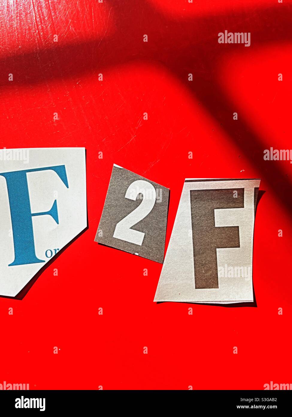 Ransom note style F 2 F meeting face to face - Smartphone Captured Stock Image