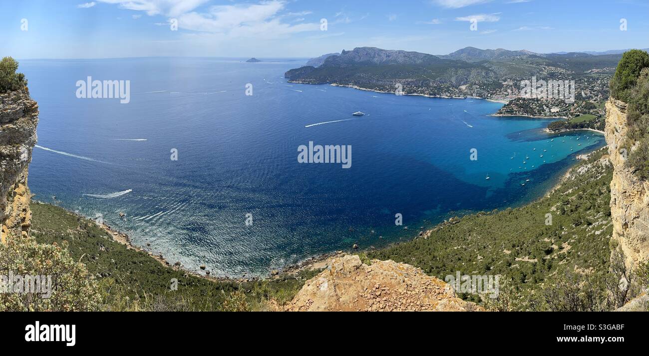 Beautiful wide panoramic view of Calanques natural park, with boats sailing on the Mediterranean near La Ciotat, Cassis and Marseille, Bouches-du-Rhône, Provence-Alpes-Côte d'Azur, south of France - Smartphone Captured Stock Image