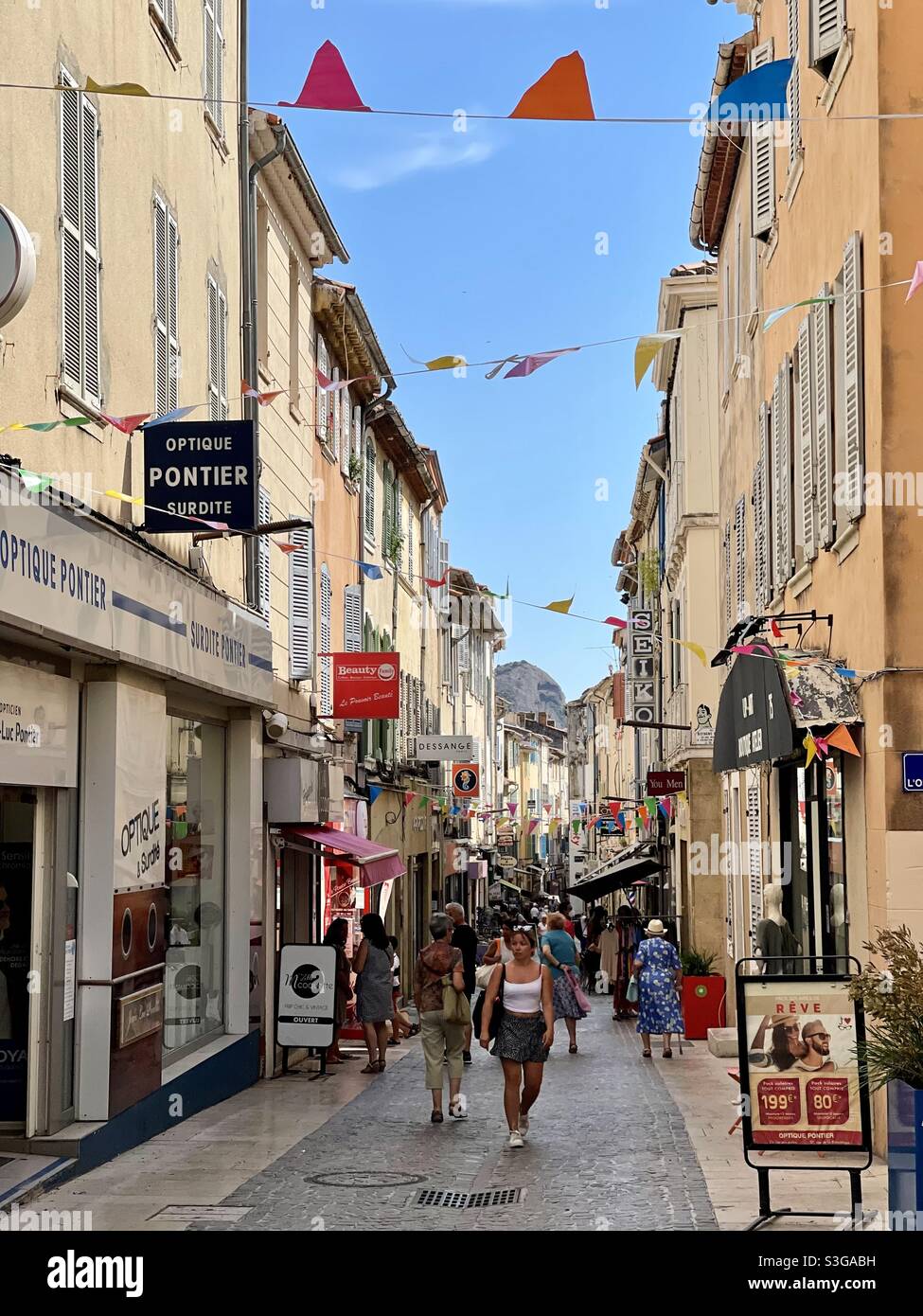 Tourists walking on the main shopping street downtown La Ciotat, near Marseille, Bouches-du-Rhône, Provence-Alpes-Côte d'Azur, south of France - Smartphone Captured Stock Image