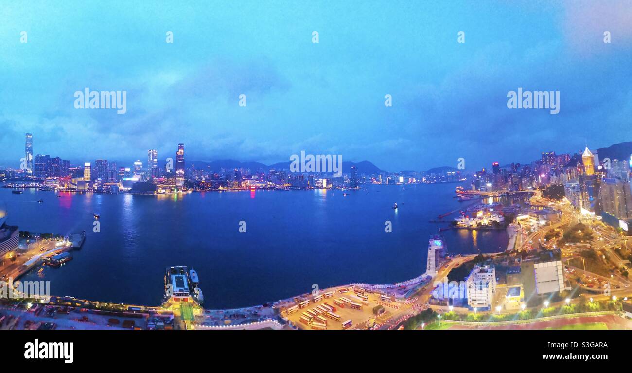 A beautiful view of the Victoria harbour and the Kowloon waterfront. Stock Photo