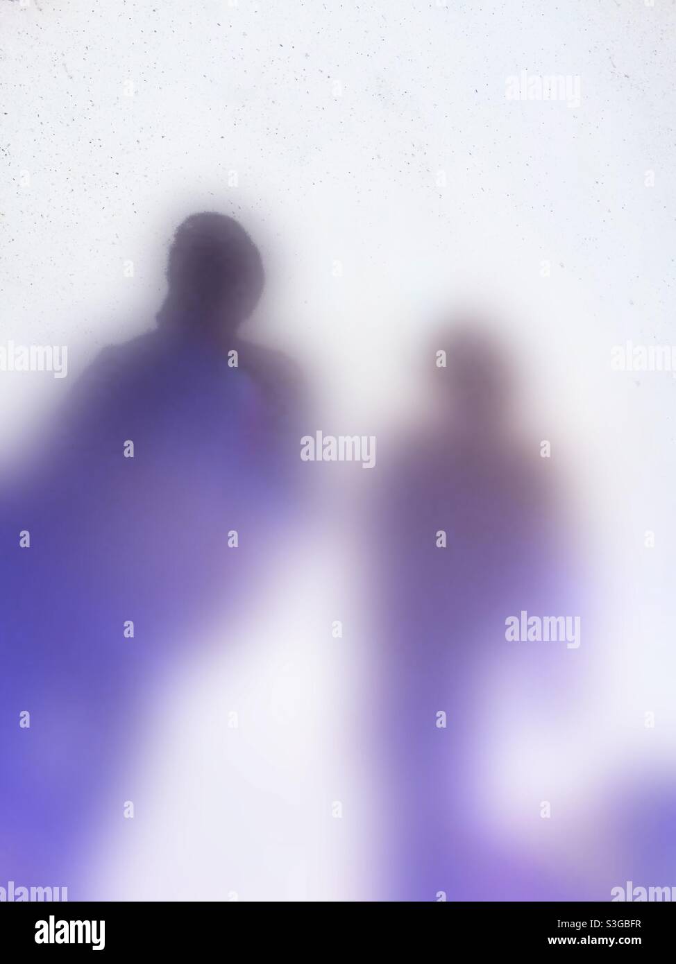 Phantoms in the fog. My parallel self. Walking beside me. Concepts: shadow, fleeting, fugacious states, companionship, penumbra, metaphor, dark matter, journey. Walking with me. - Smartphone Captured Stock Image