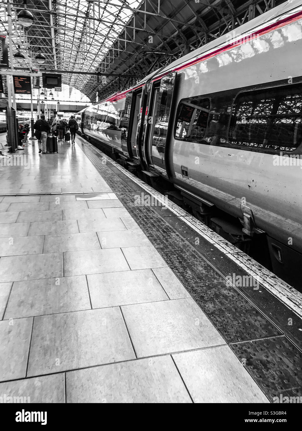Train on a Piccadilly, Manchester station platform - Smartphone Captured Stock Image