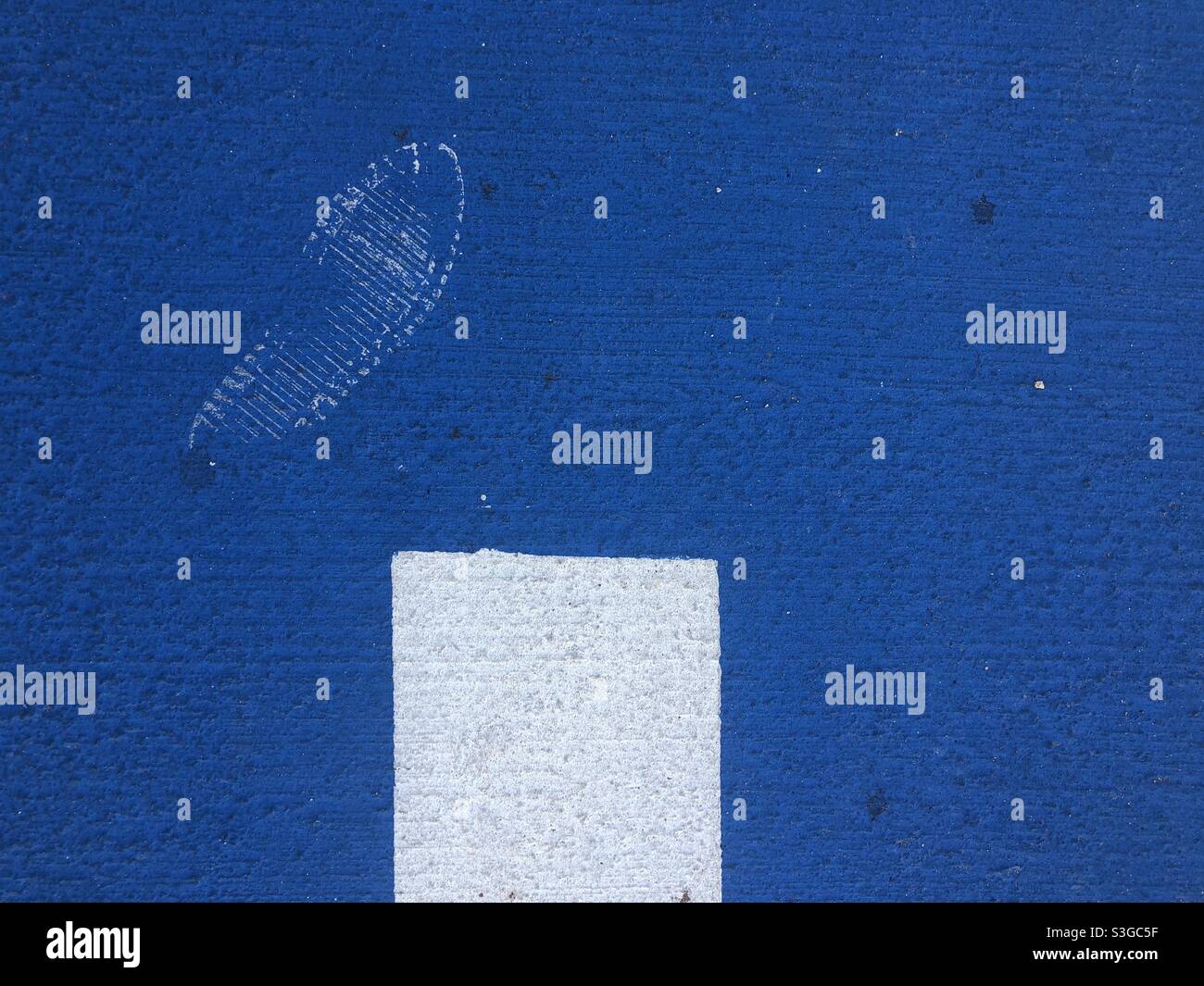 Footprint on blue surface - Smartphone Captured Stock Image