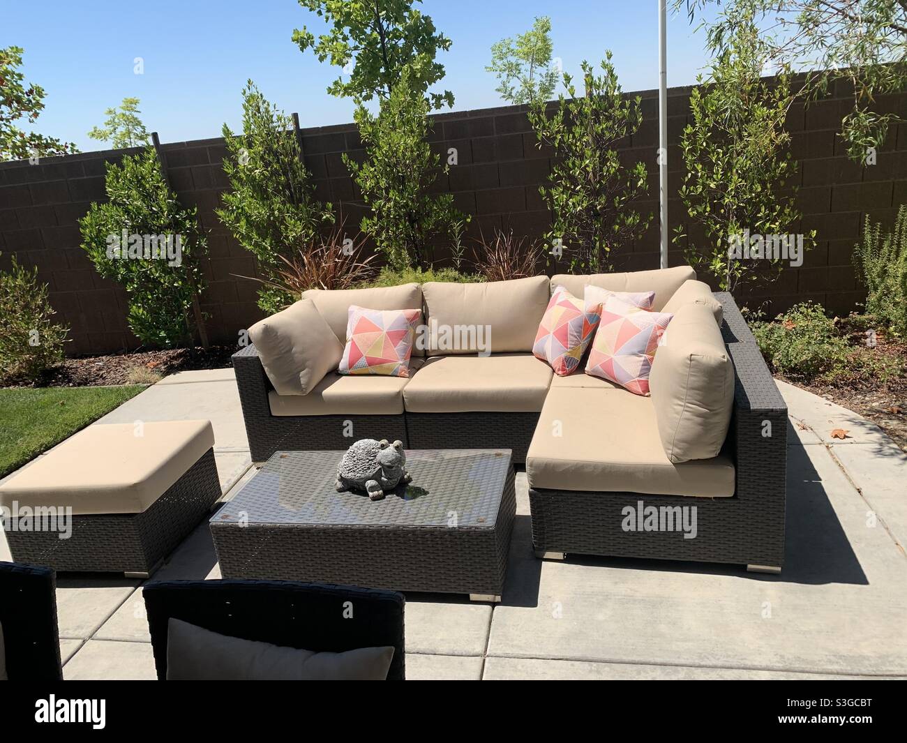 Outdoor Patio Furniture Loveseat Cushions And Table For Dining Outside Turtle Statue Figurines Stock Photo Alamy