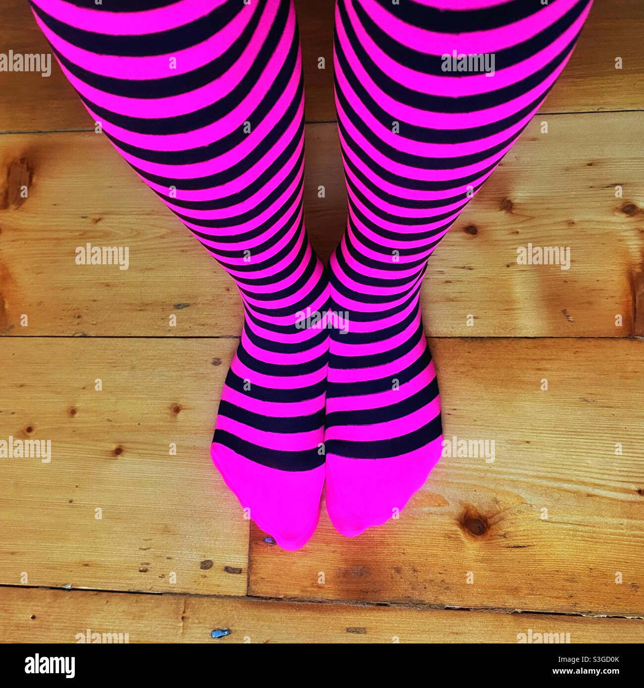Looking down at stripped leggings. An interesting and arresting image or just painful on the eye?! Photo Credit - ©️ COLIN HOSKINS. - Smartphone Captured Stock Image