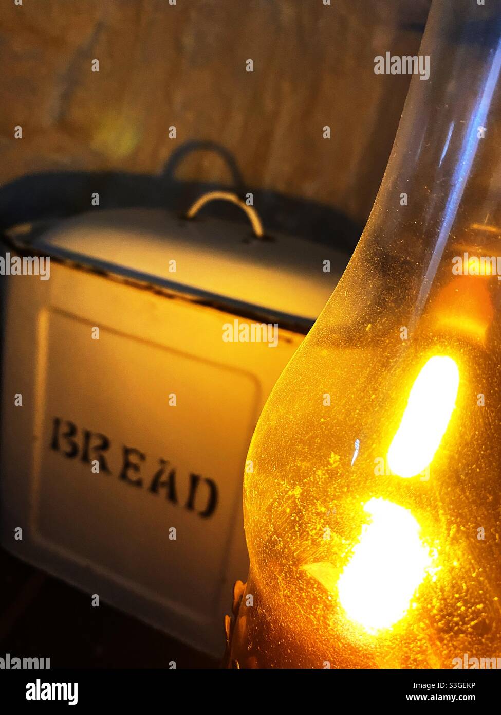 Antique bread bin and lamp Stock Photo Alamy