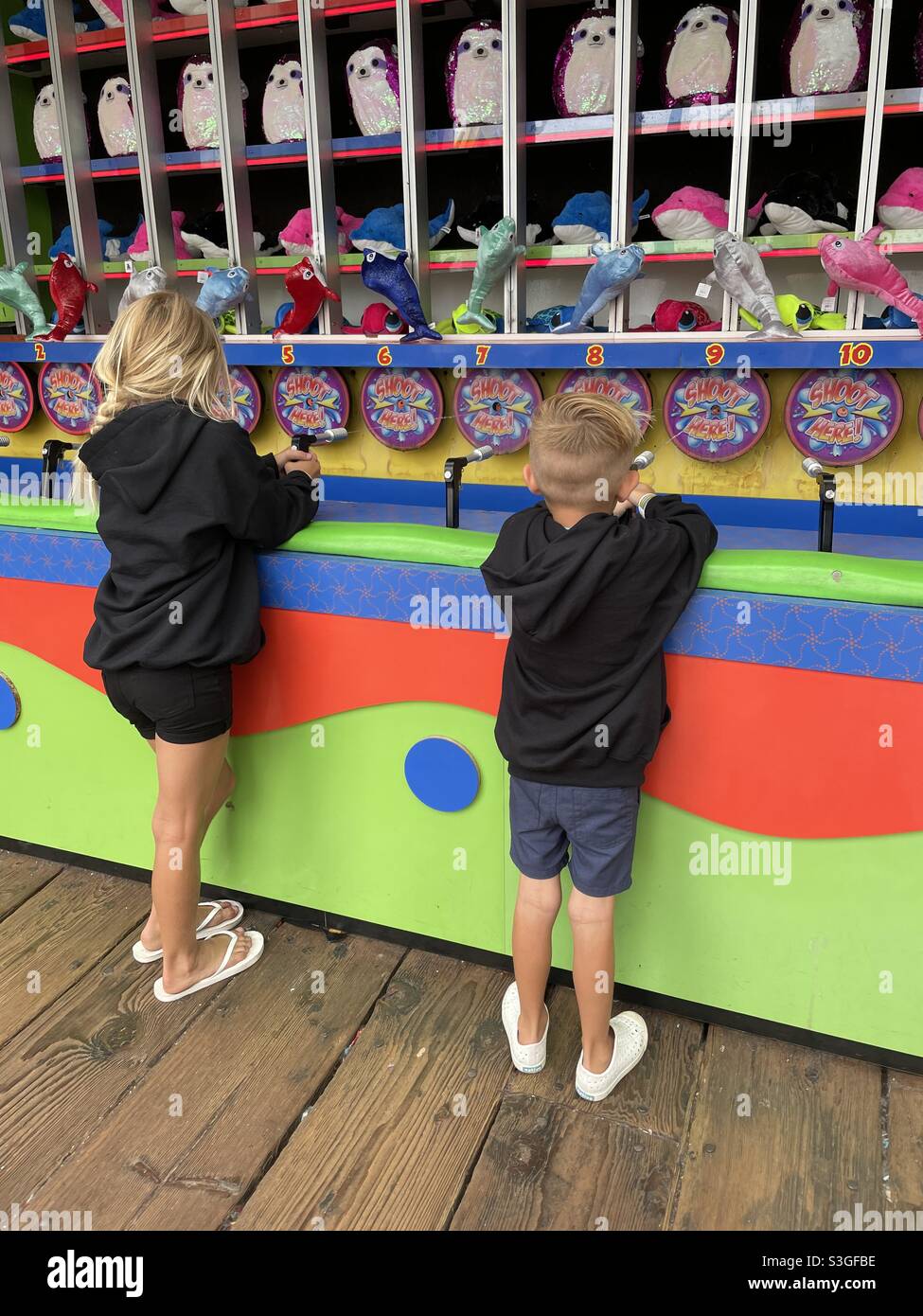 Children playing outdoor carnival game - Smartphone Captured Stock Image