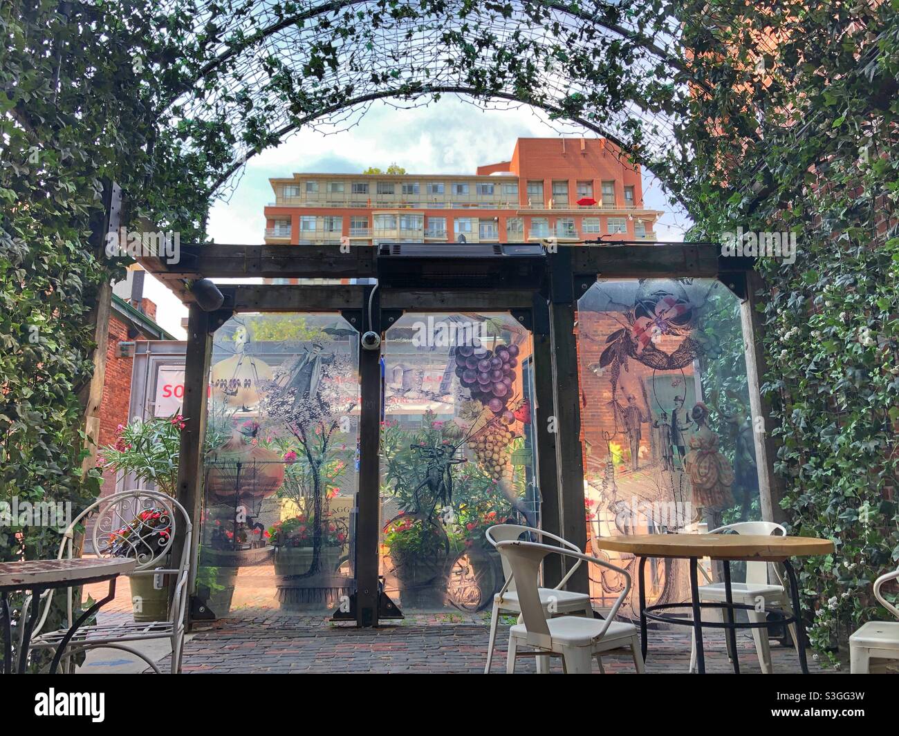 A covered patio in the Historical Distillery District in a Toronto neighbourhood. - Smartphone Captured Stock Image