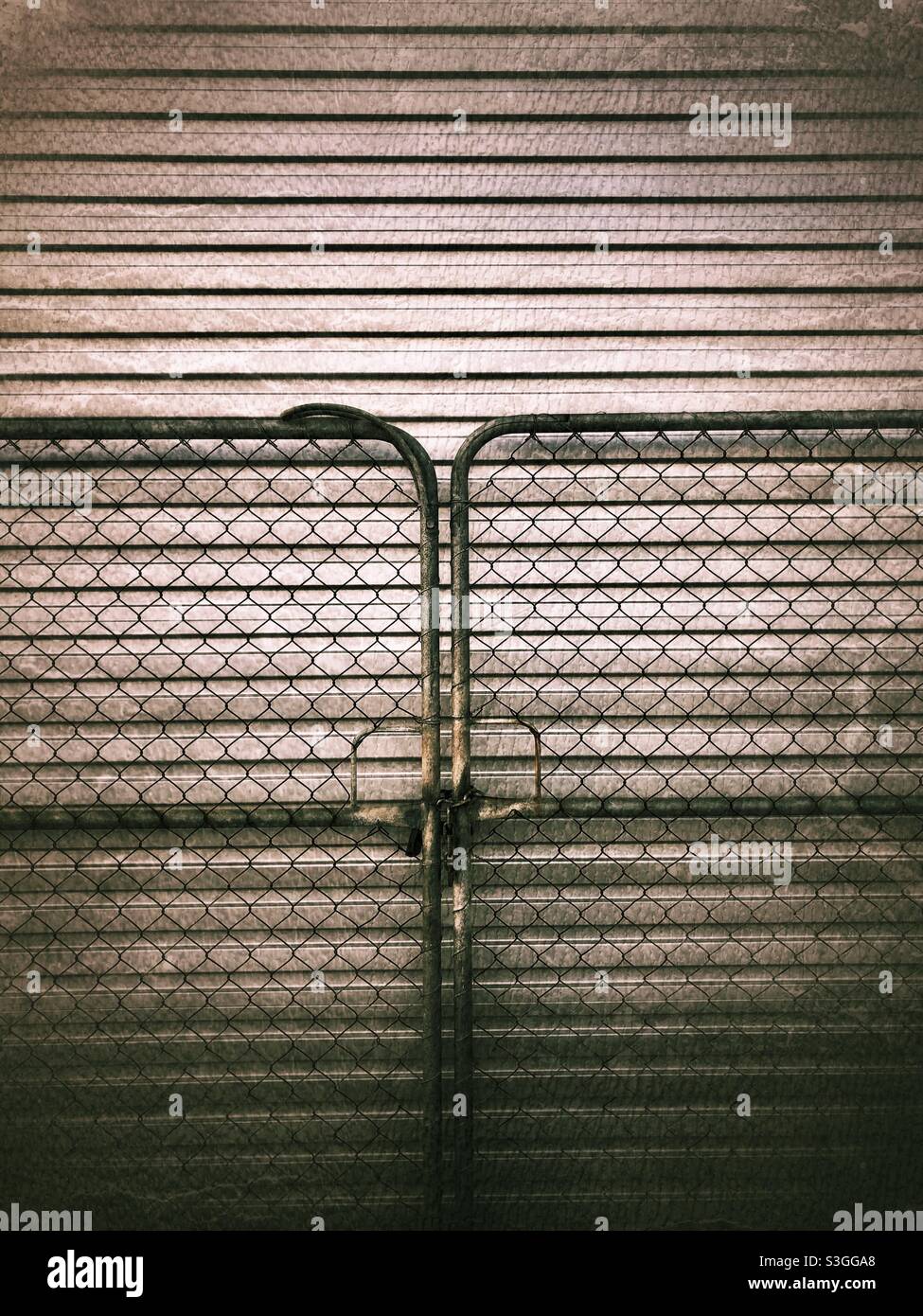 Closed metallic gates. Stock Photo
