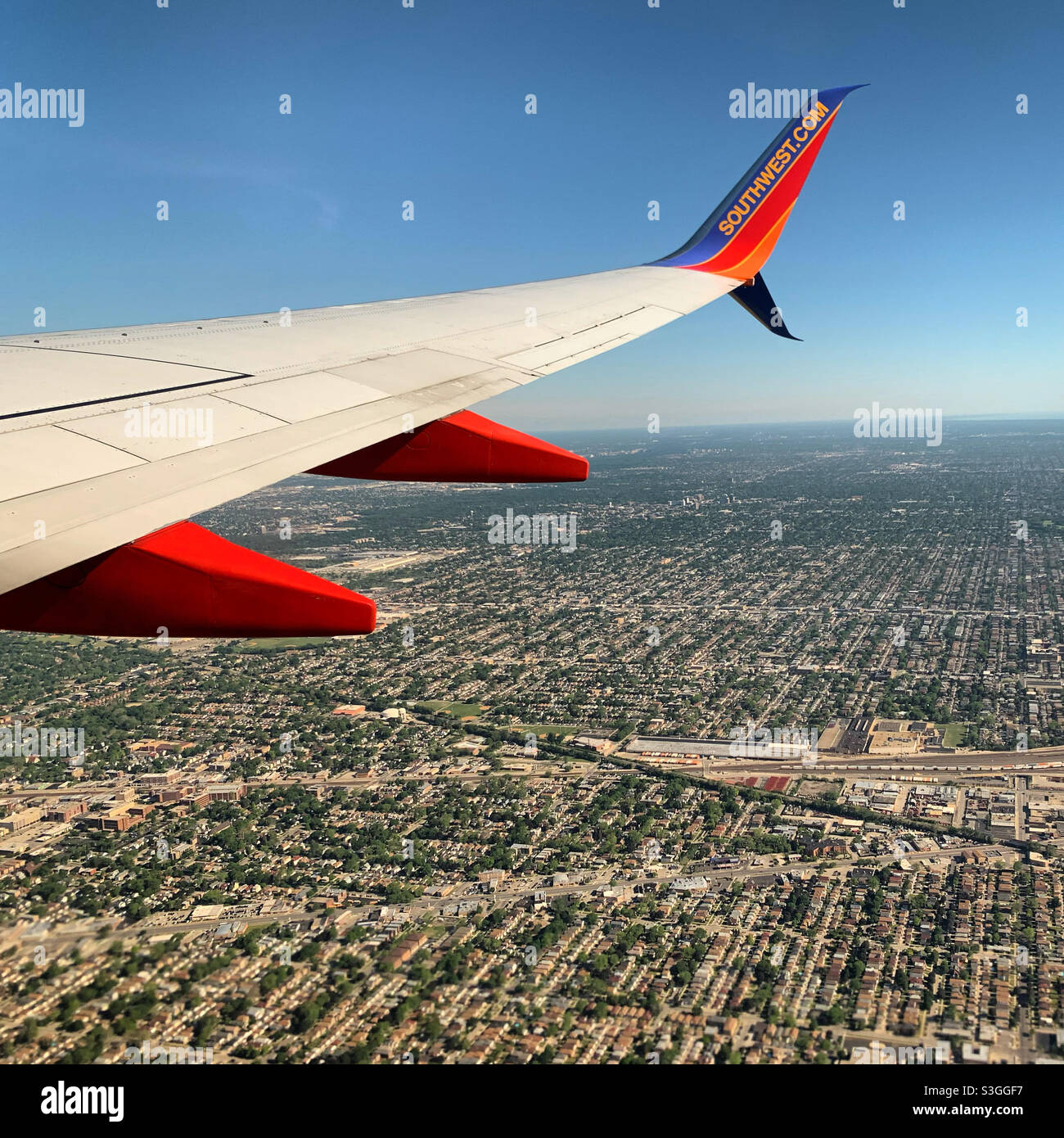 May, 2021, the wing of a Southwest airplane, near Chicago Midway Airport, Illinois, United States - Smartphone Captured Stock Image