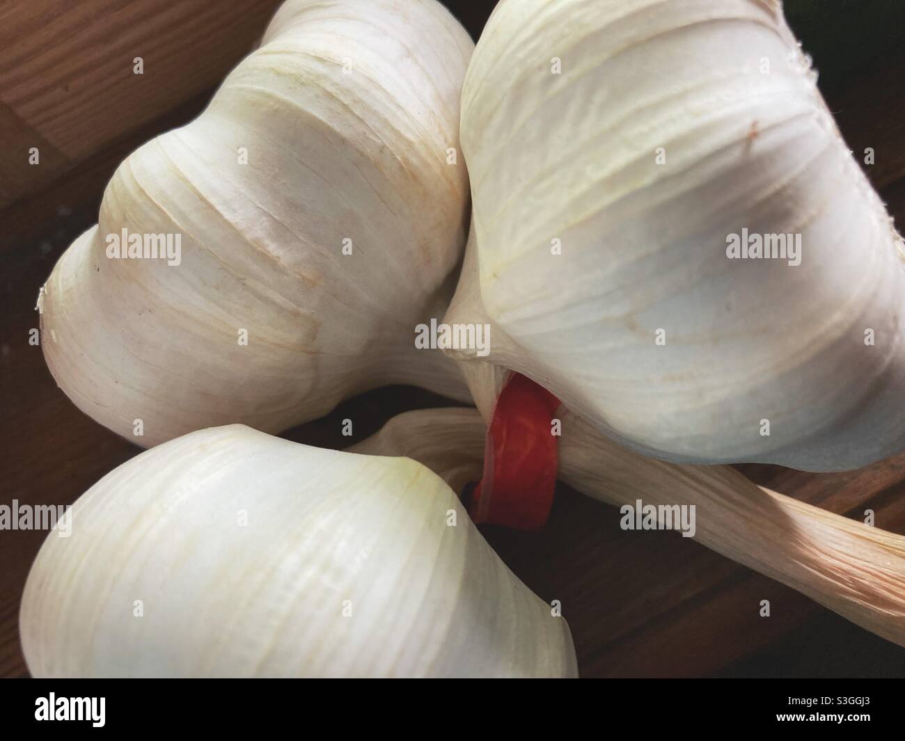 Three bulbs of garlic hi-res stock photography and images - Alamy
