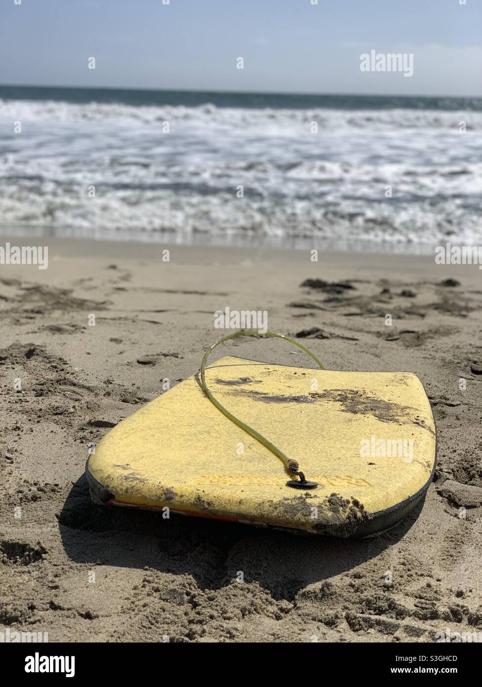 Boogie board at the beach in the sand Stock Photo Alamy
