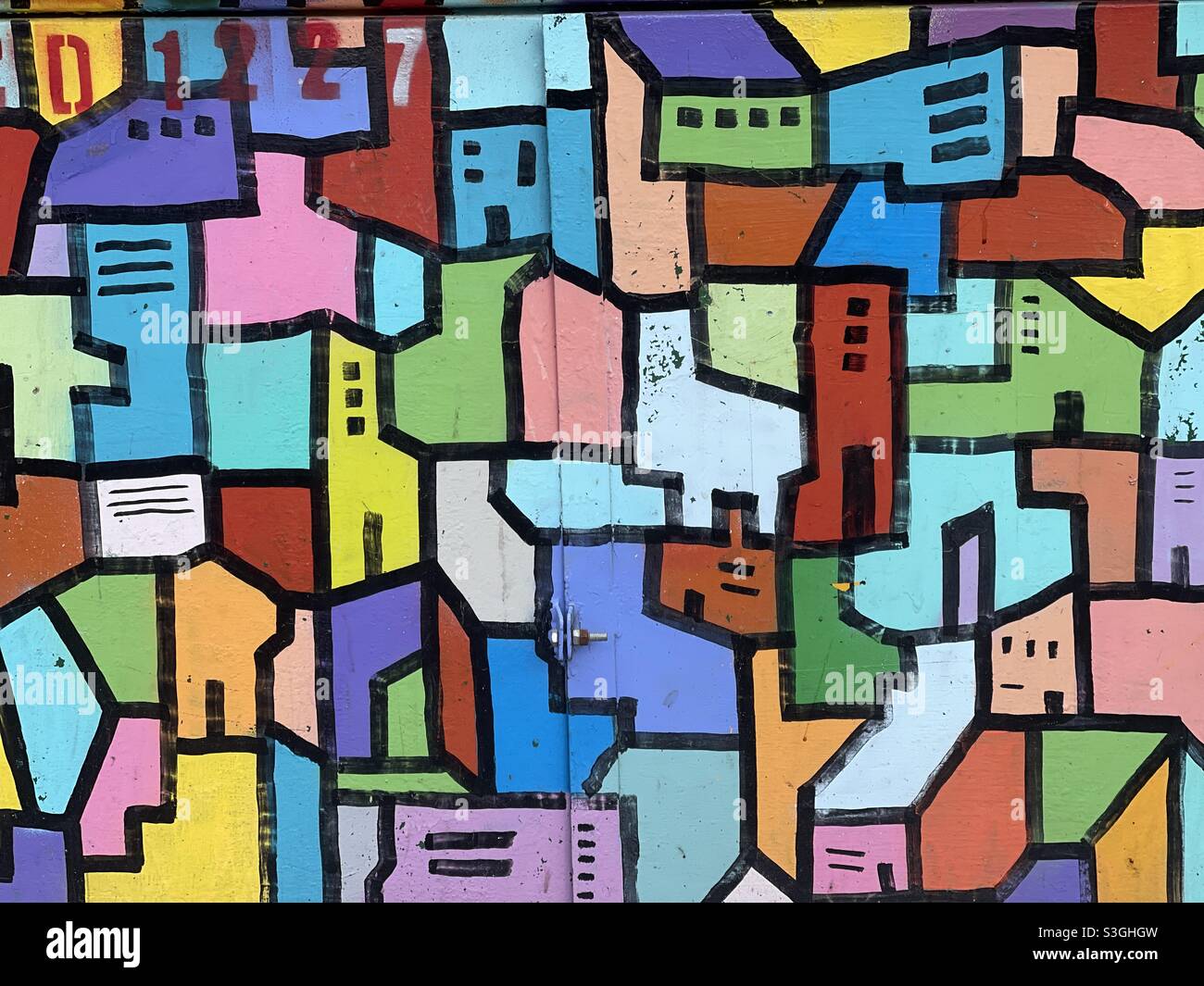 Colorful graffiti on an electricity metallic box in Bucharest, Romania - Smartphone Captured Stock Image