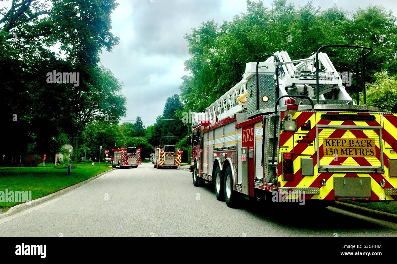 Emergency vehicles on the street, Ontario, Canada. Concepts: prepared, response, first responders, preparedness. - Smartphone Captured Stock Image