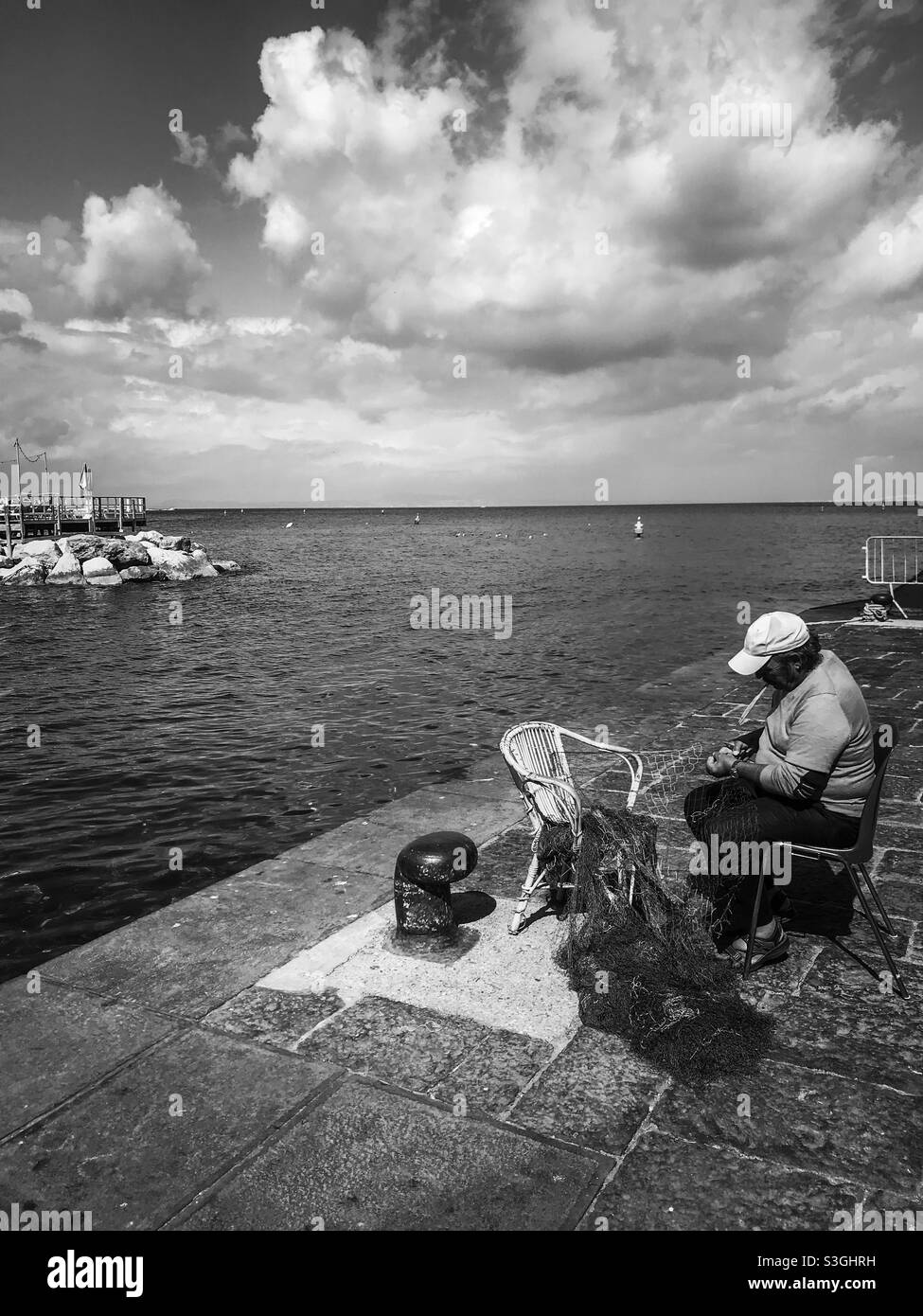 Fisherman fixing a net, marina grande, Sorrento Stock Photo