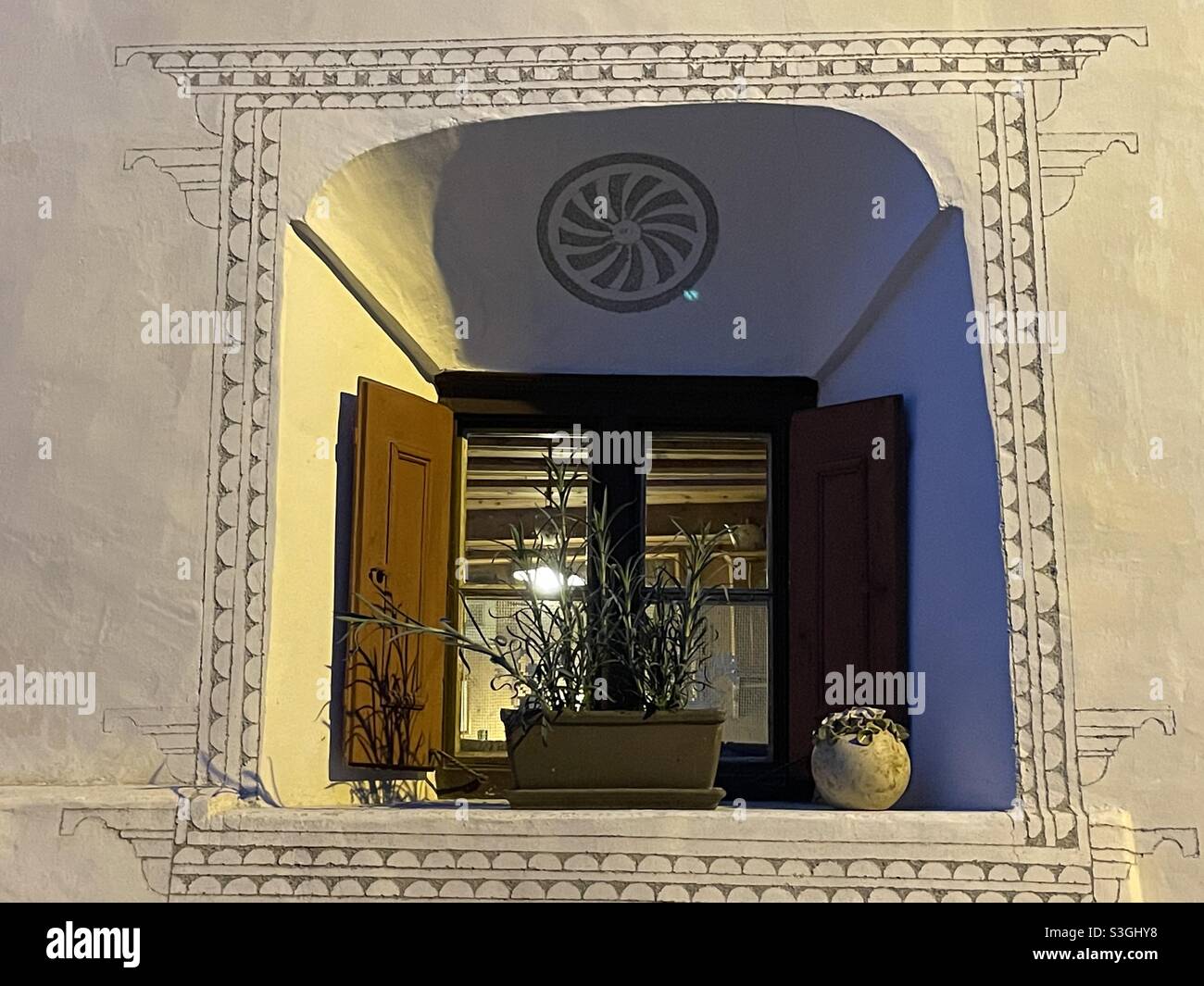 Typical window of traditional Engadin house. Switzerland Stock Photo