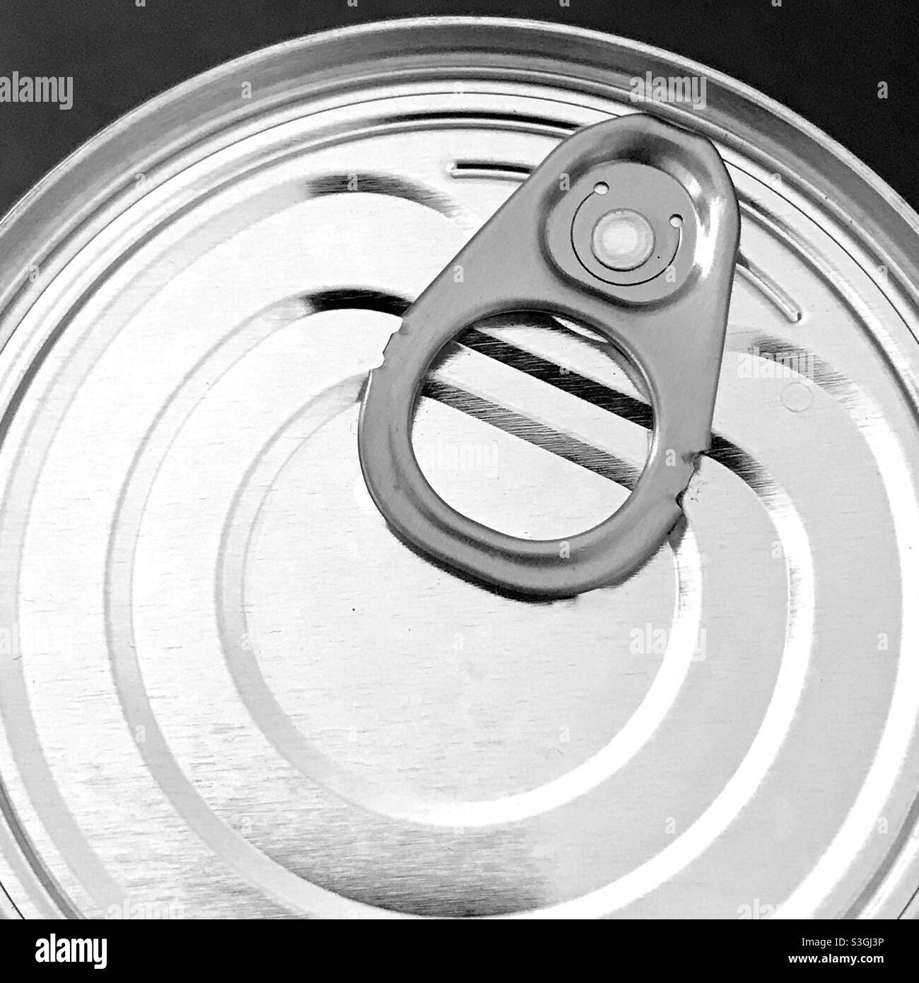 It’s in the can! Canned food ring pull close up. Stock Photo
