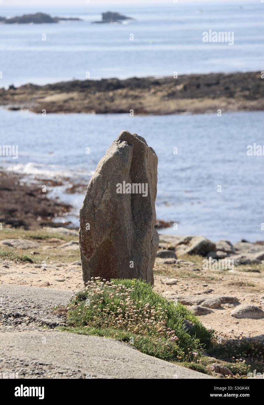 Standing stone on the wild coast of Quiberon in Brittany, France - Smartphone Captured Stock Image