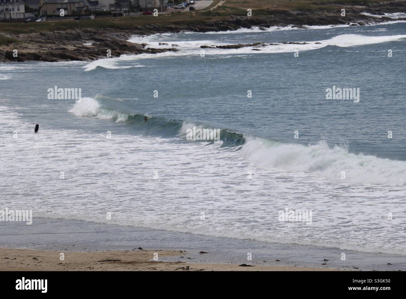 Waves and surf at the beach of Quiberon in Brittany, France - Smartphone Captured Stock Image