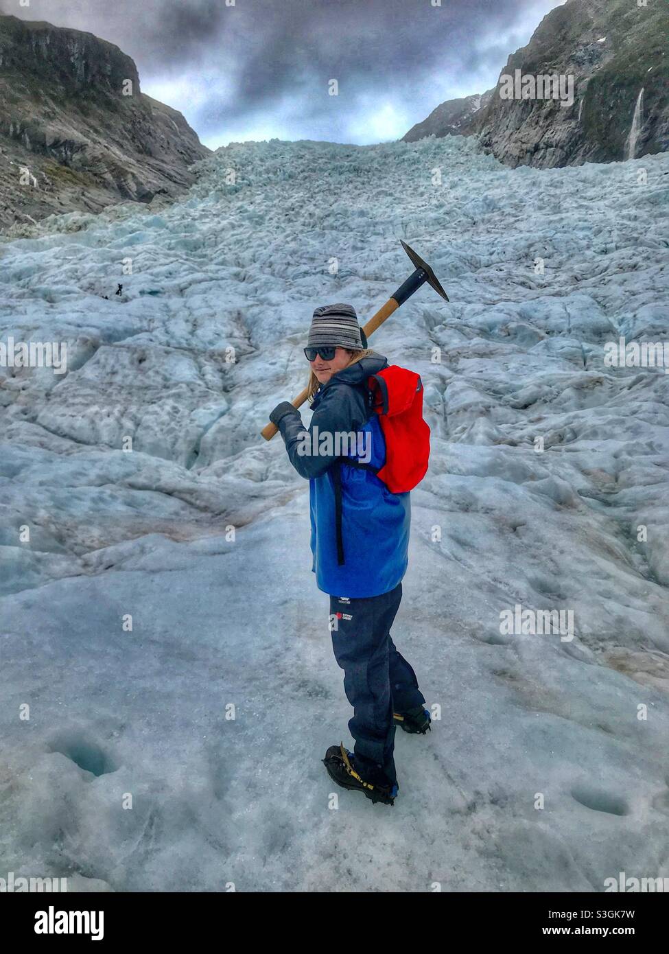 Teenager Heli hiking on Fox Glacier, South Island, New Zealand - Smartphone Captured Stock Image