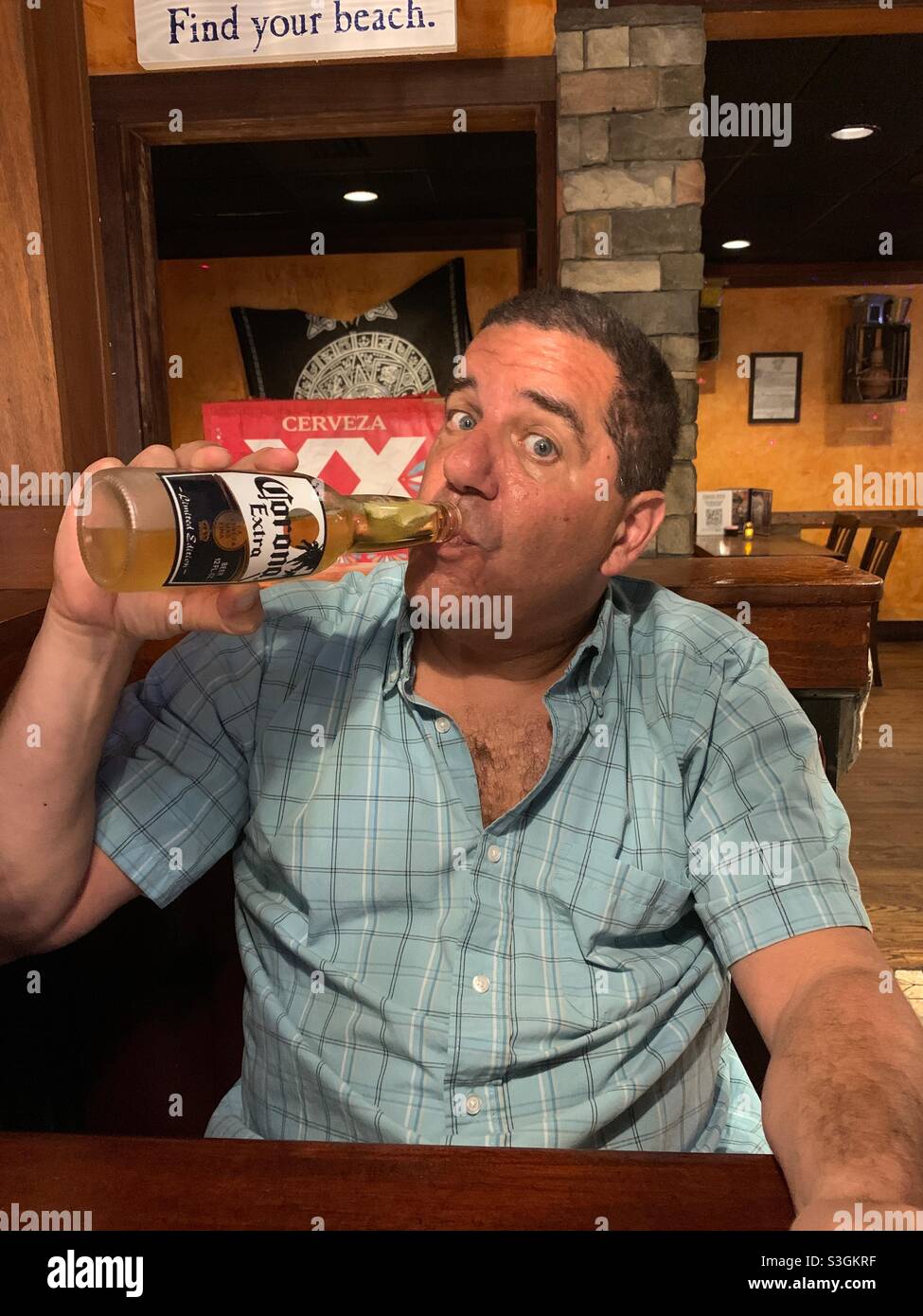 A gentleman and his beer - Smartphone Captured Stock Image