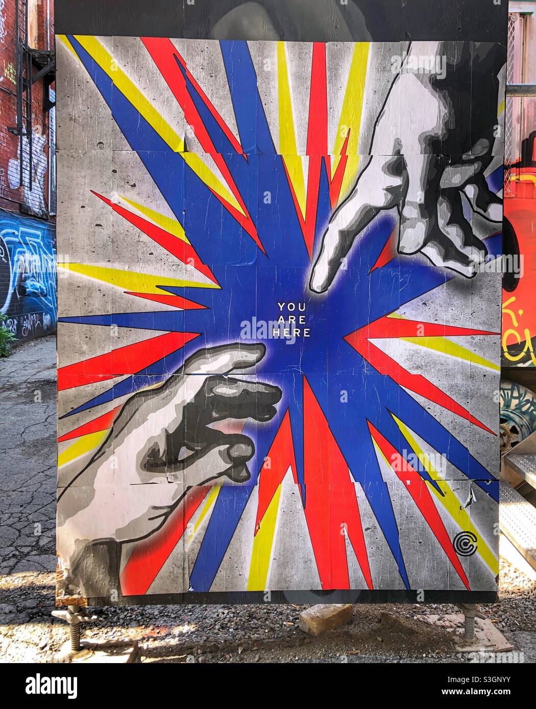 Urban street art in Graffiti Alley in a Toronto neighbourhood. - Smartphone Captured Stock Image