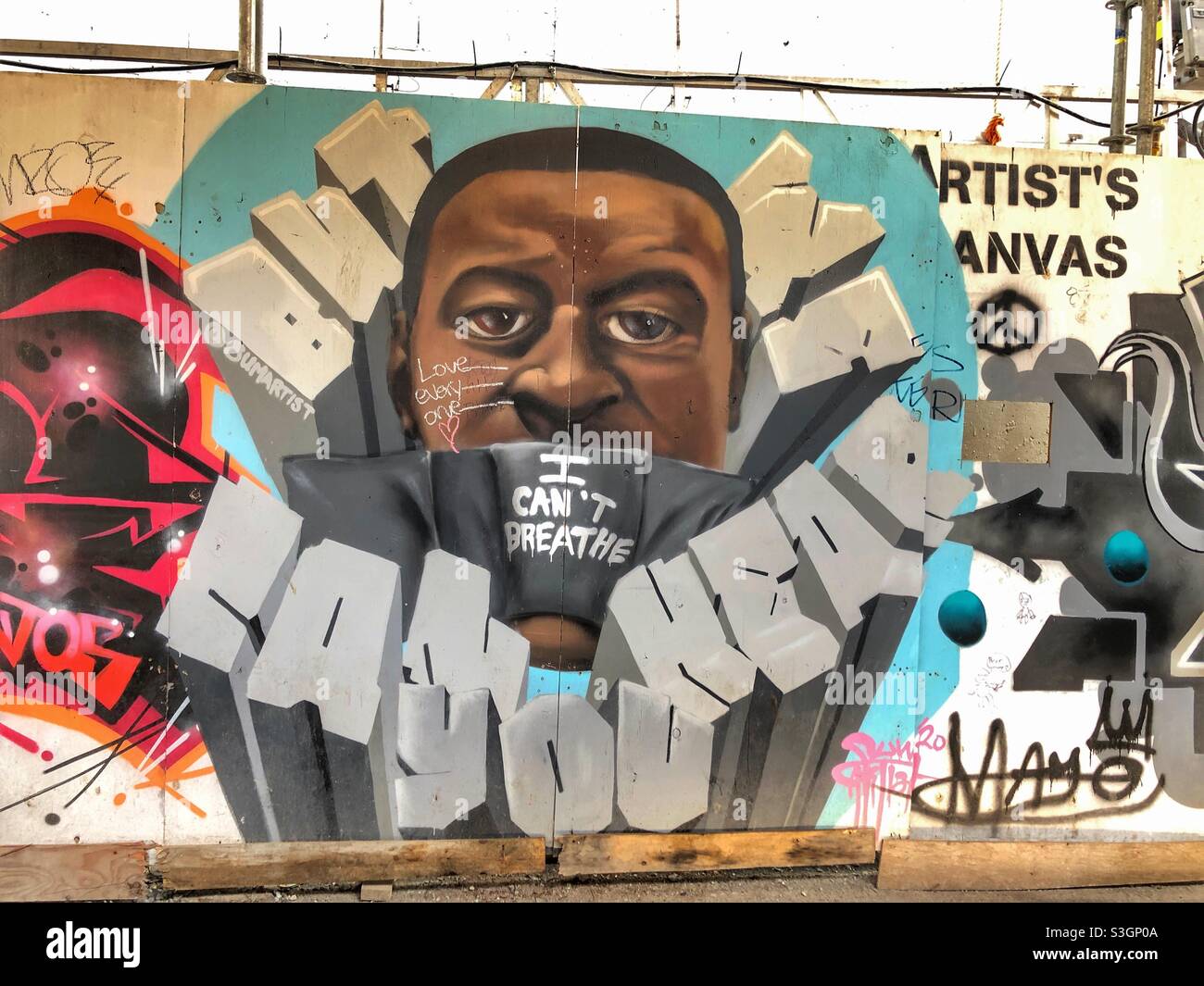 Urban street art mural in Graffiti Alley in a Toronto neighbourhood. - Smartphone Captured Stock Image