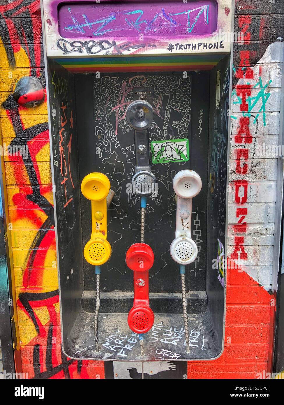Urban street art in Graffiti alley in a Toronto neighbourhood. - Smartphone Captured Stock Image