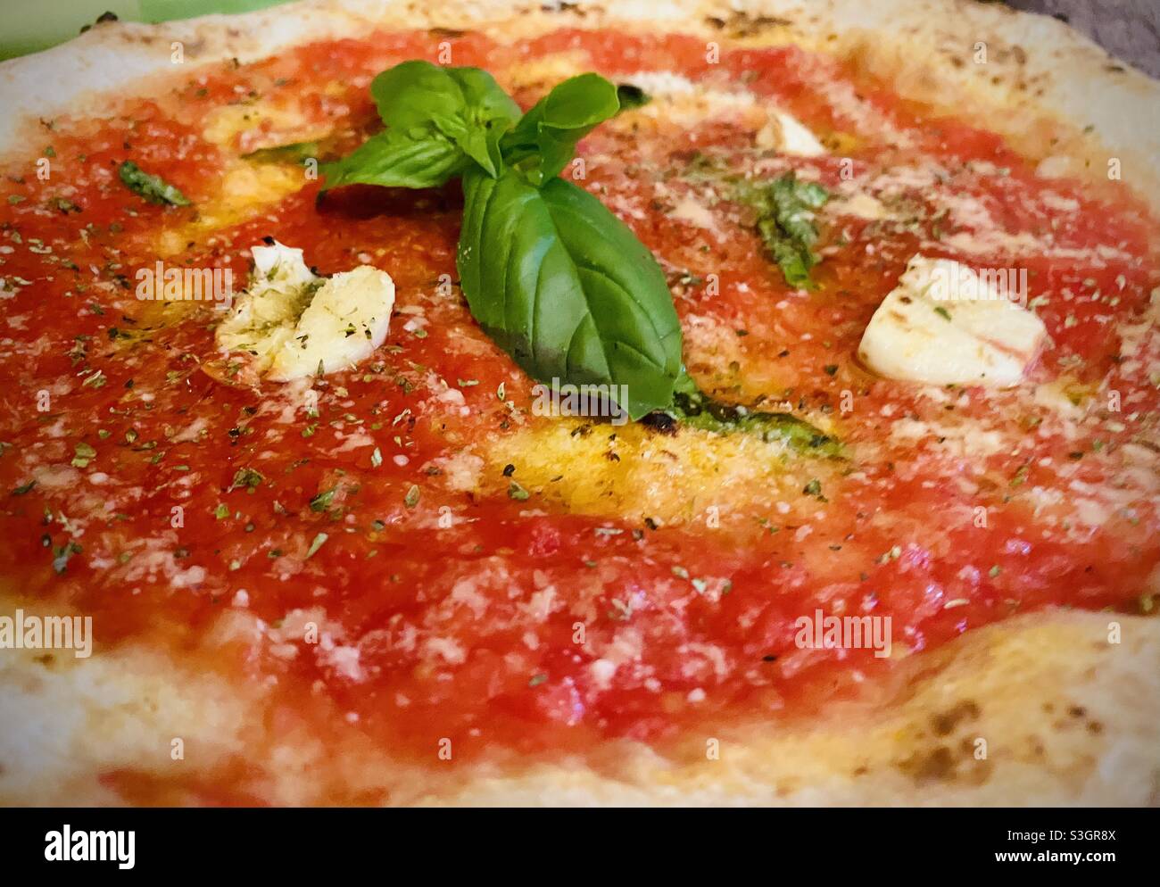 Classic marinara pizza Milanese style in Milan, Italy Stock Photo
