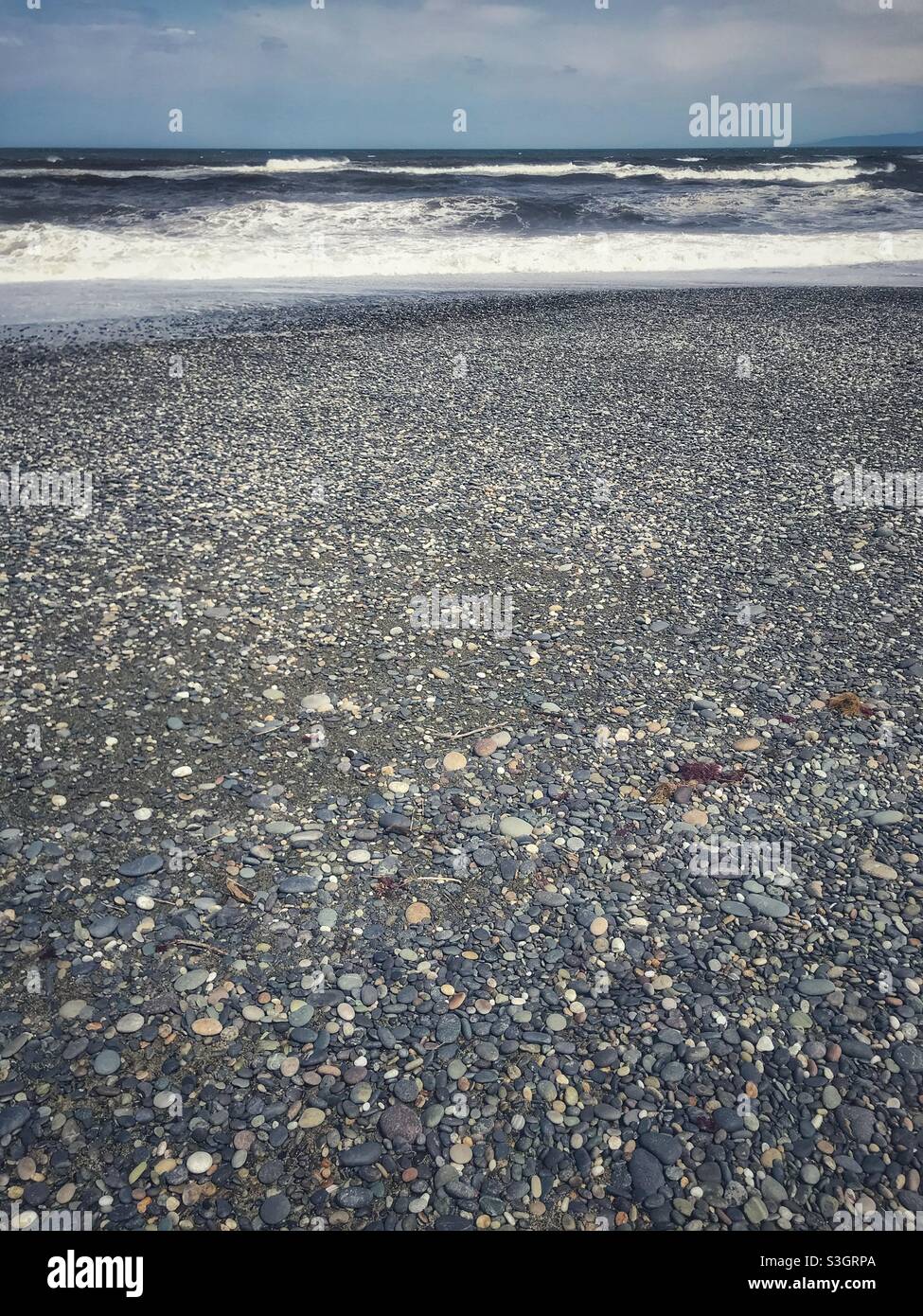 Pebble beach in the Southland region of New Zealand’s South Island - Smartphone Captured Stock Image