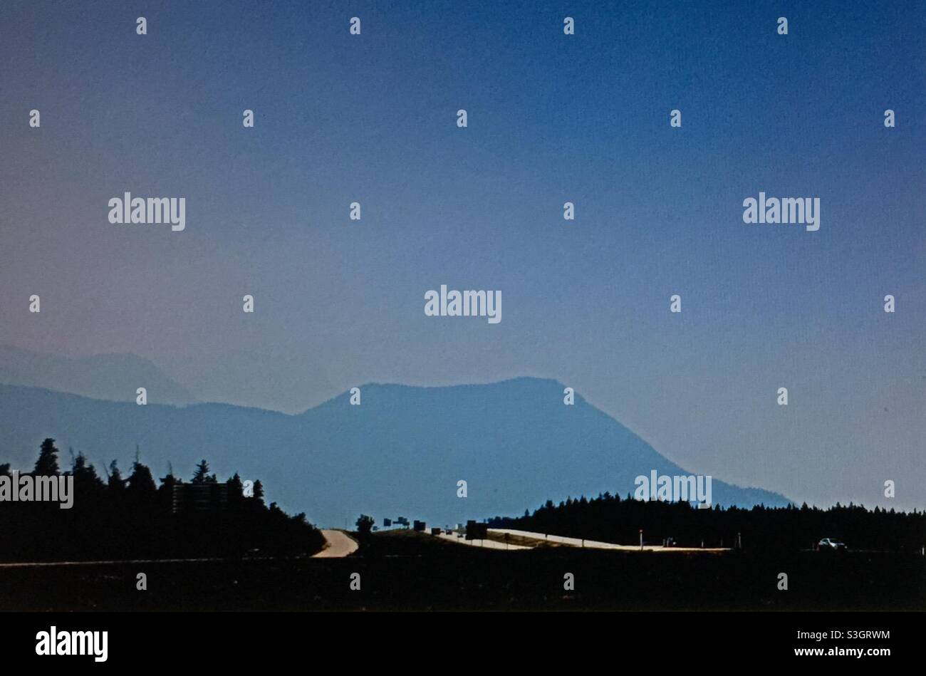 Smoky day in the mountains, Kananaskis  country,  Smoke from British Columbia forest fires. - Smartphone Captured Stock Image