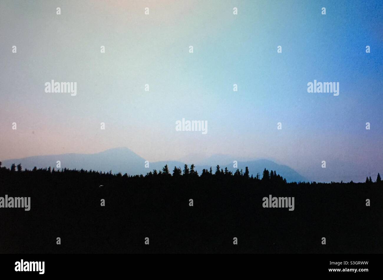 Smoky day, in the mountains, Kananaskis  country,  Smoke from,British Columbia, forest fires. - Smartphone Captured Stock Image