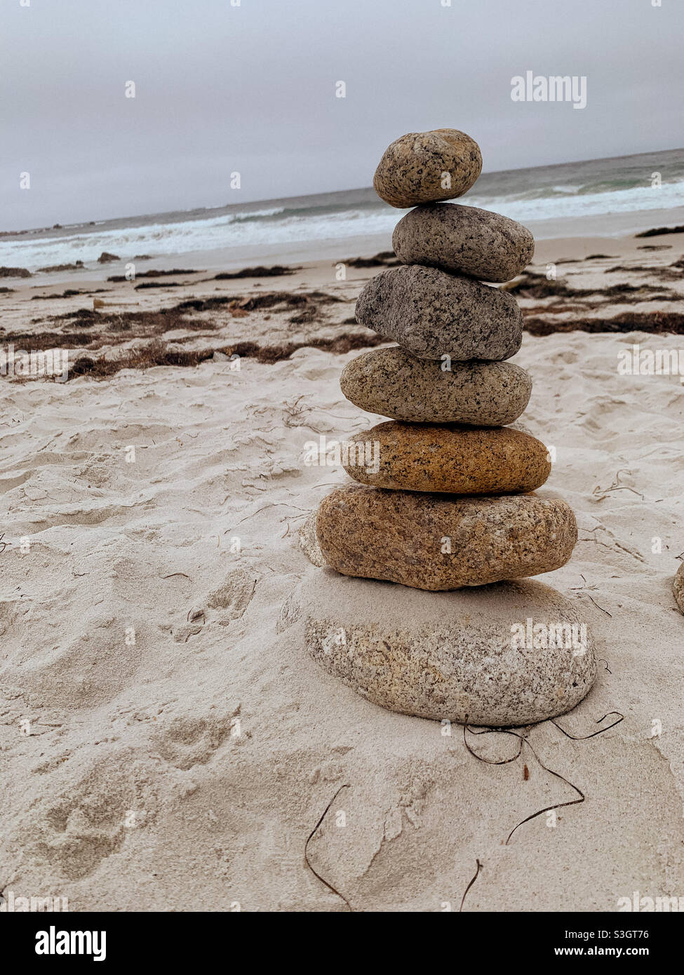 Rocks stacked on top of each other at the beach Stock Photo Alamy