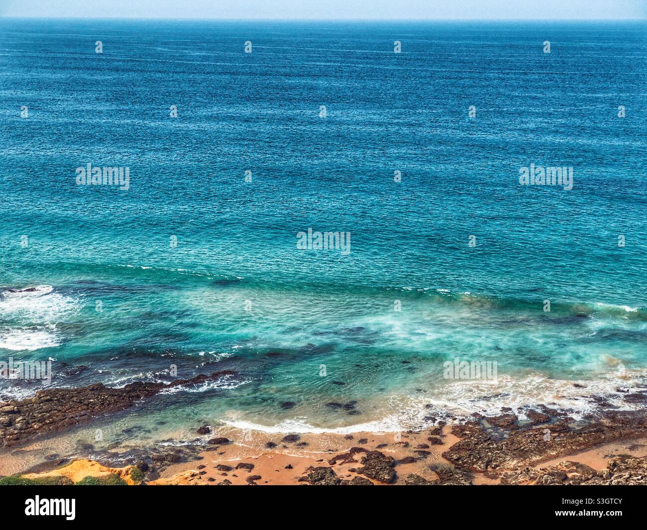Tranquil view down onto the beach on the North Coast of South Africa - Smartphone Captured Stock Image
