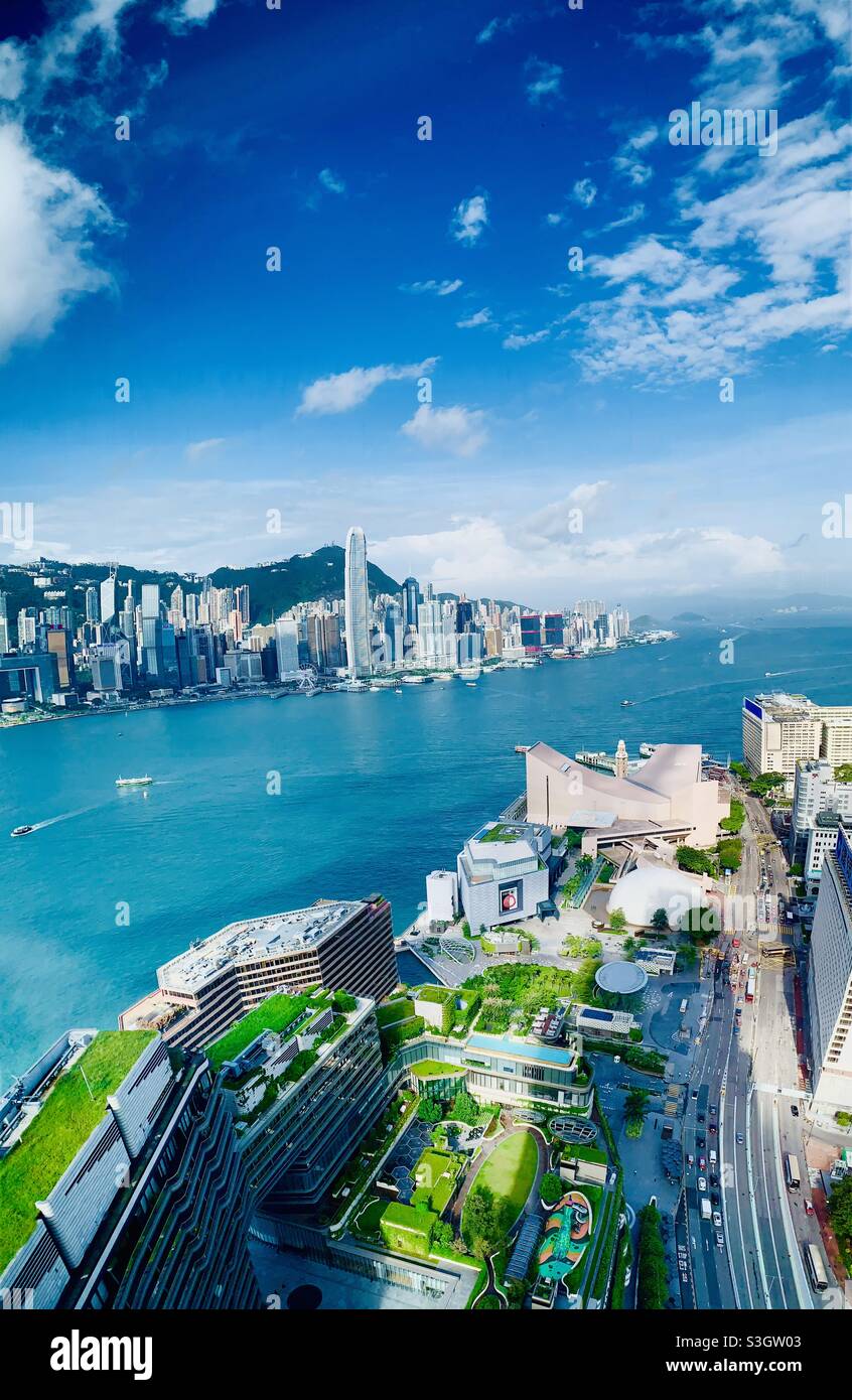 A view of Victoria harbour , HK island and the Kowloon waterfront in Hong Kong. Stock Photo