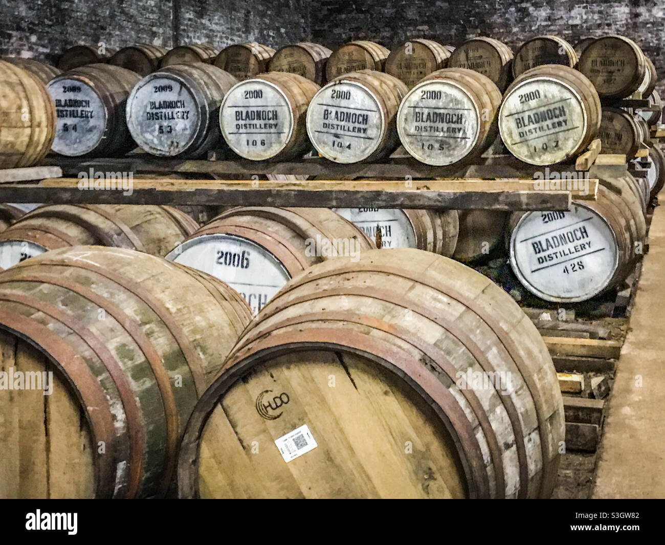 Whisky barrels in warehouse storage at Bladnoch Whisky Distillery in