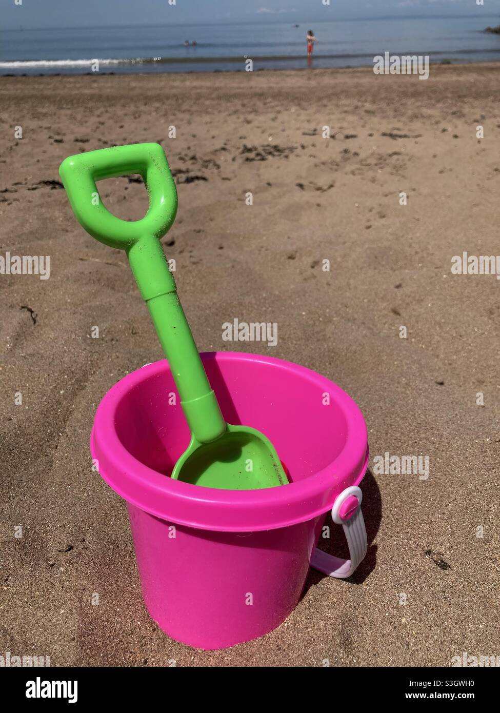 Bucket and spade on Minehead beach, Devon Stock Photo Alamy