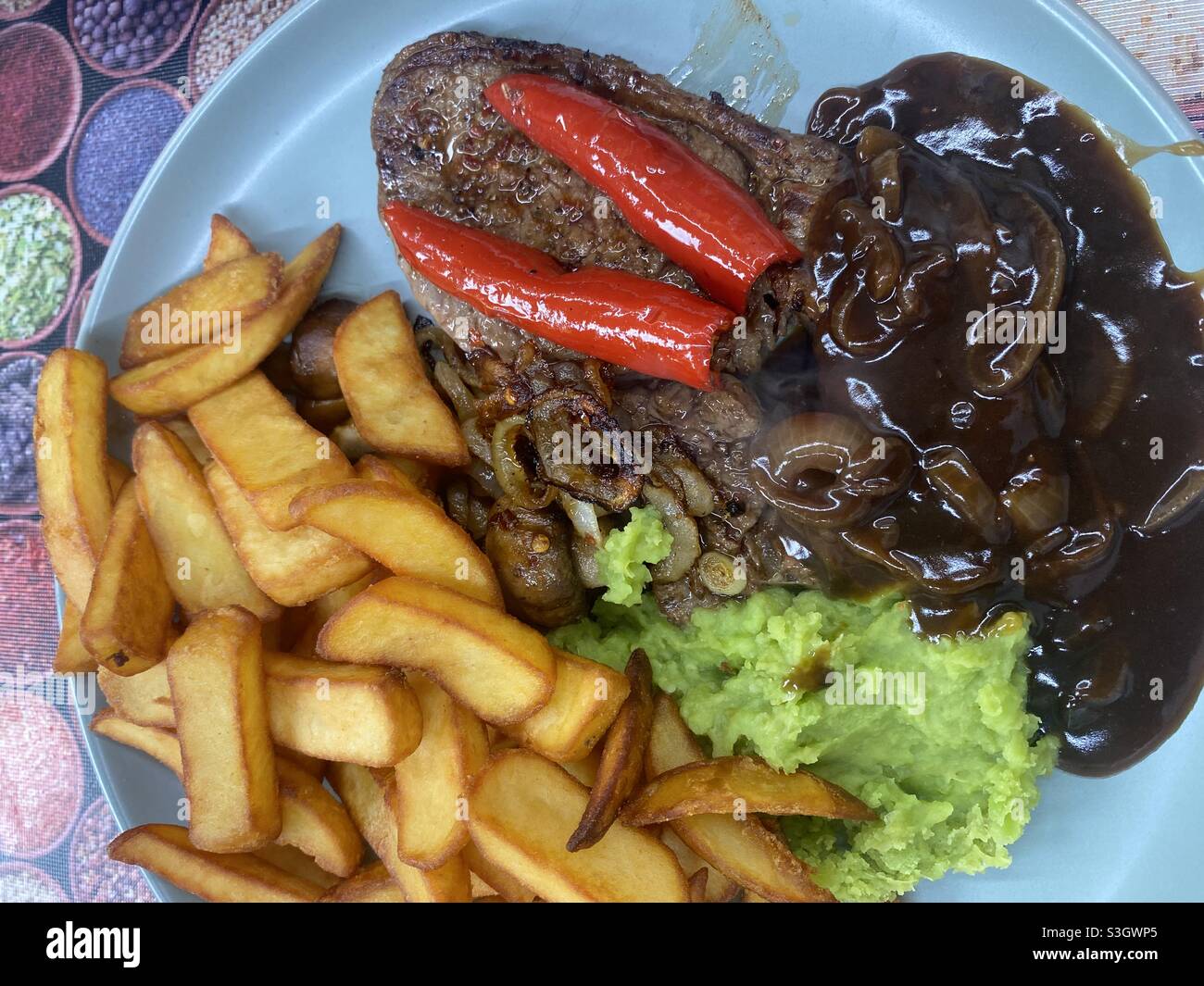 Steak and Onions with Fries - Smartphone Captured Stock Image