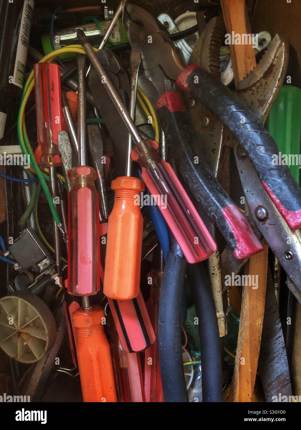 Tools pilled up in a box Stock Photo