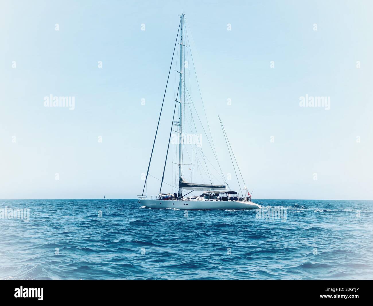 Sailing boat in the sea Stock Photo