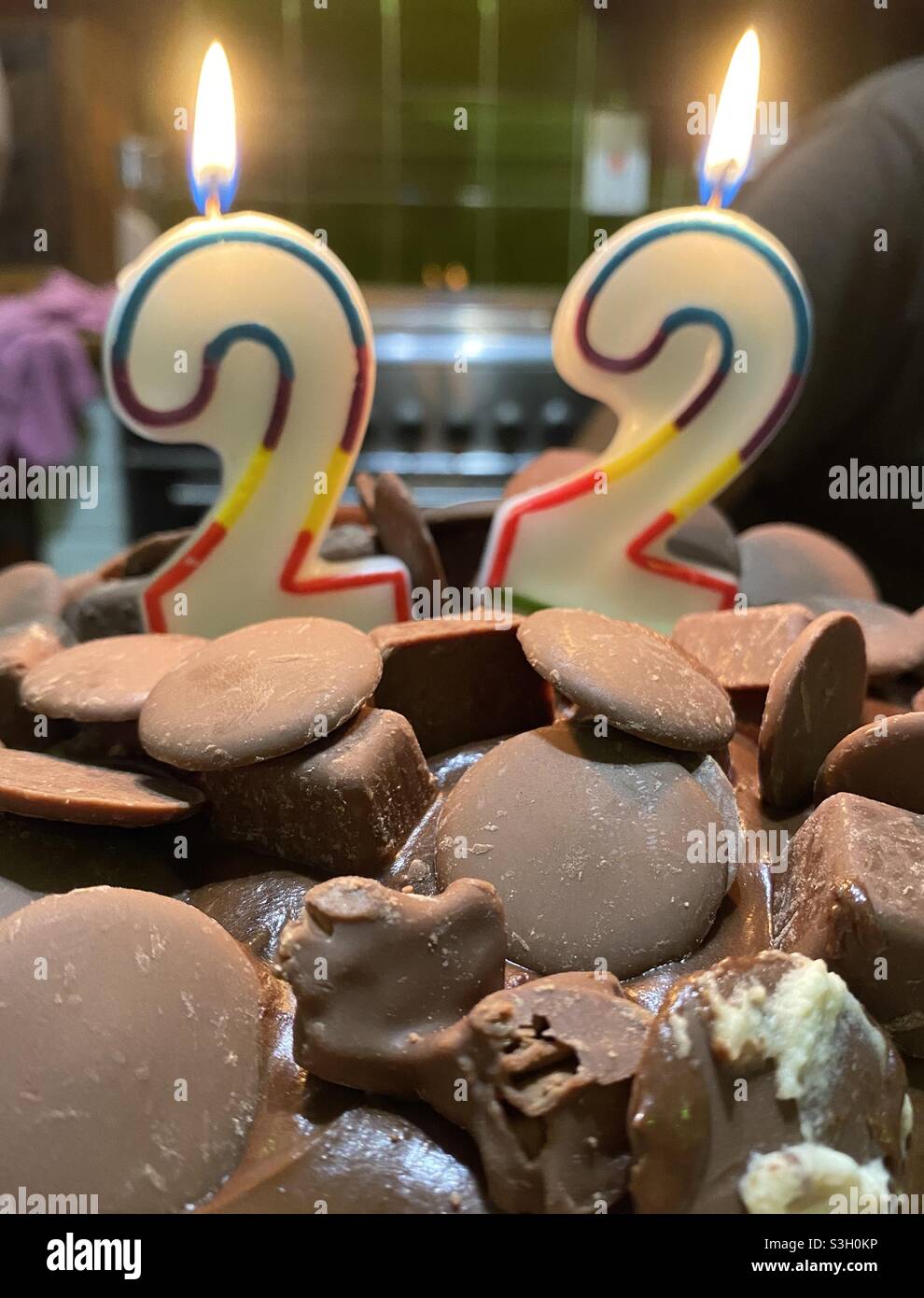 Chocolate loaded birthday cake with 22 candles Stock Photo - Alamy