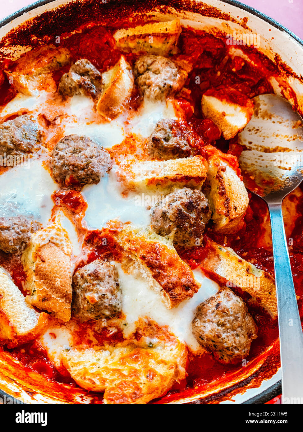 Turkey meatball and garlic bread bake Stock Photo Alamy